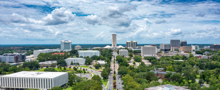 image of city in florida with blue sky and white clouds
